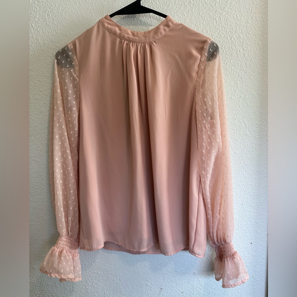 Women’s long sleeve pink shirt. Size medium. In excellent condition, Japna brand